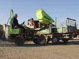 Bob loading topsoil onto one of our delivery vehicles