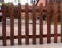palisade fencing with cottage tops